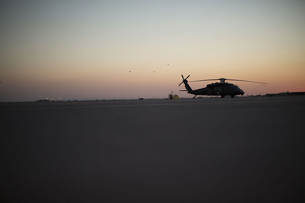  A U.S. Army Blackhawk helicopter sits on the tarmac at an Army base.